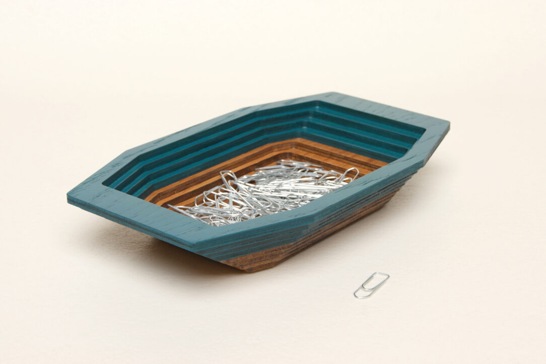 Connected box in bicolor oak wood fashioned by successive layers with double bottom