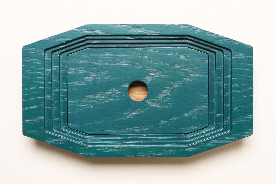 Connected box in bicolor oak wood fashioned by successive layers with double bottom