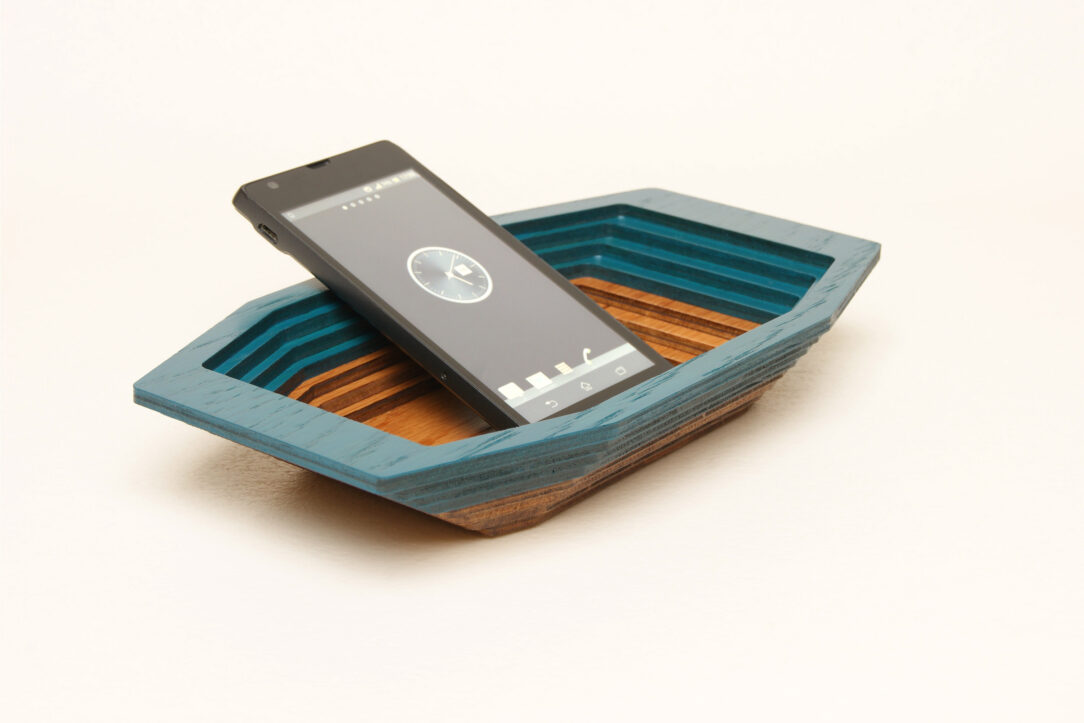 Connected box in bicolor oak wood fashioned by successive layers with double bottom