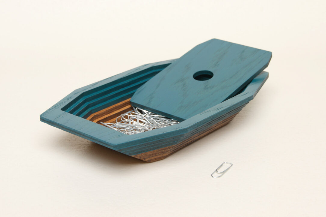 Connected box in bicolor oak wood fashioned by successive layers with double bottom